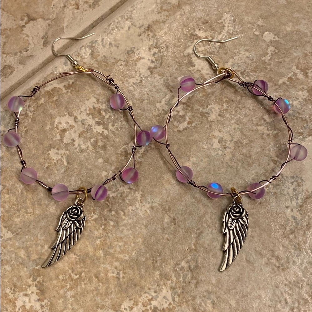 Hand made hoop earrings , with real purple beads
